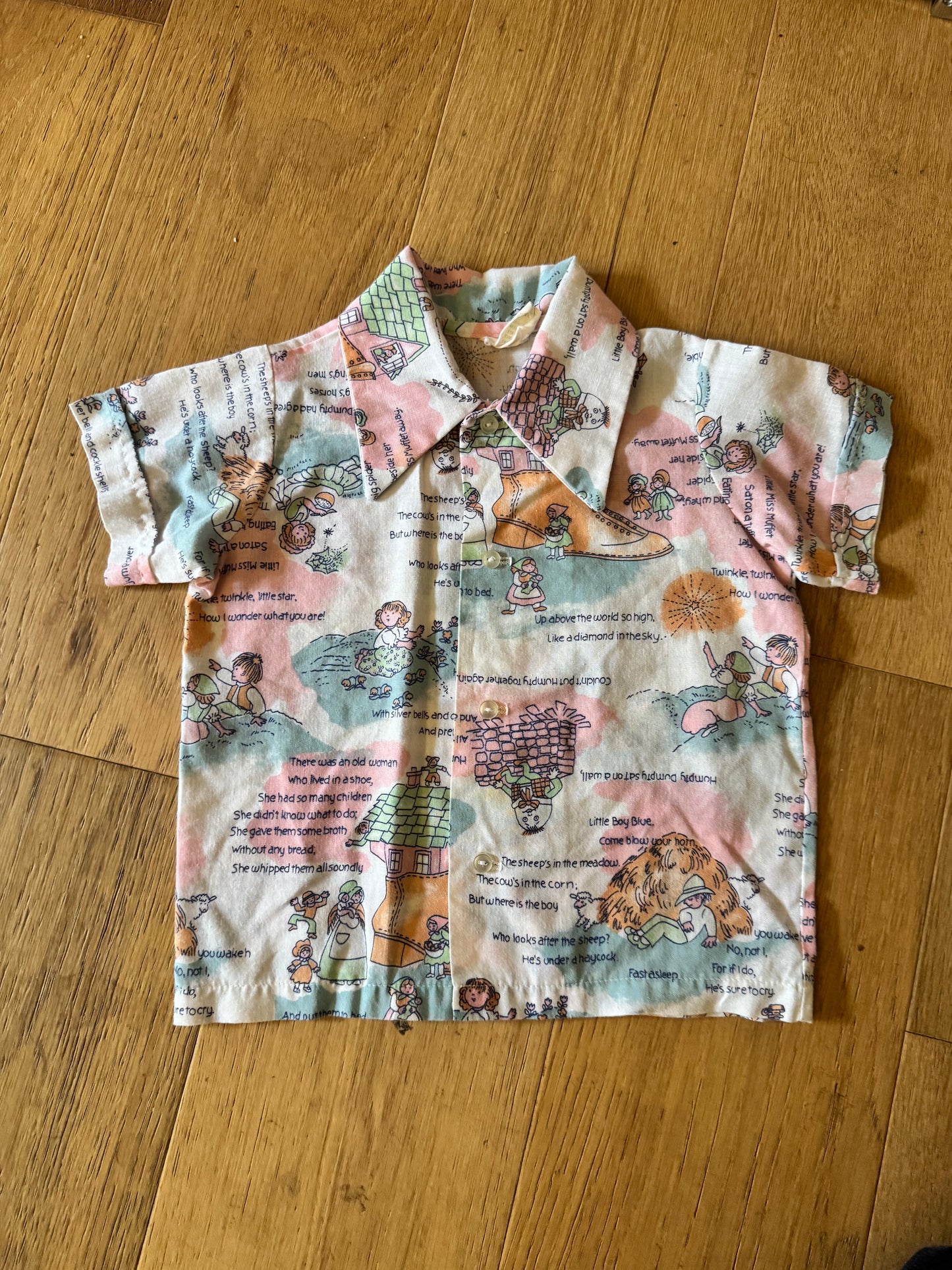 Vintage kids button down short sleeve shirt with nursery rhymes
